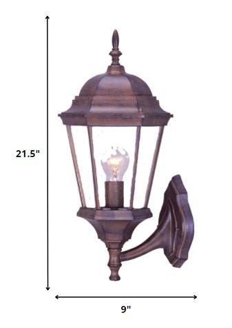 Dark brown swing arm outdoor lantern wall light with clear glass and dome top – classic exterior wall lighting for patios and entryways shown with dimensions of 21 point 5 inches high by 9 inches wide