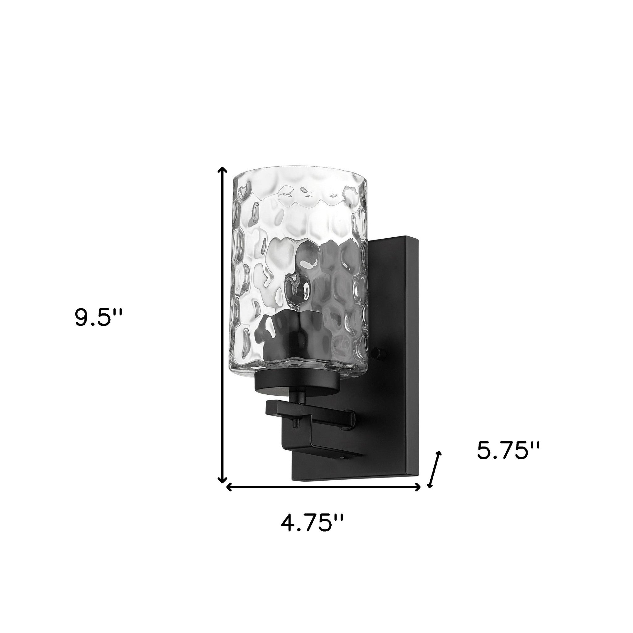 Black metal wall sconce with pebbled glass shade – modern indoor single-light fixture shown with dimensions of 9 point 5 inches high by 4 point 75 inches wide by 5 point 75 inches deep