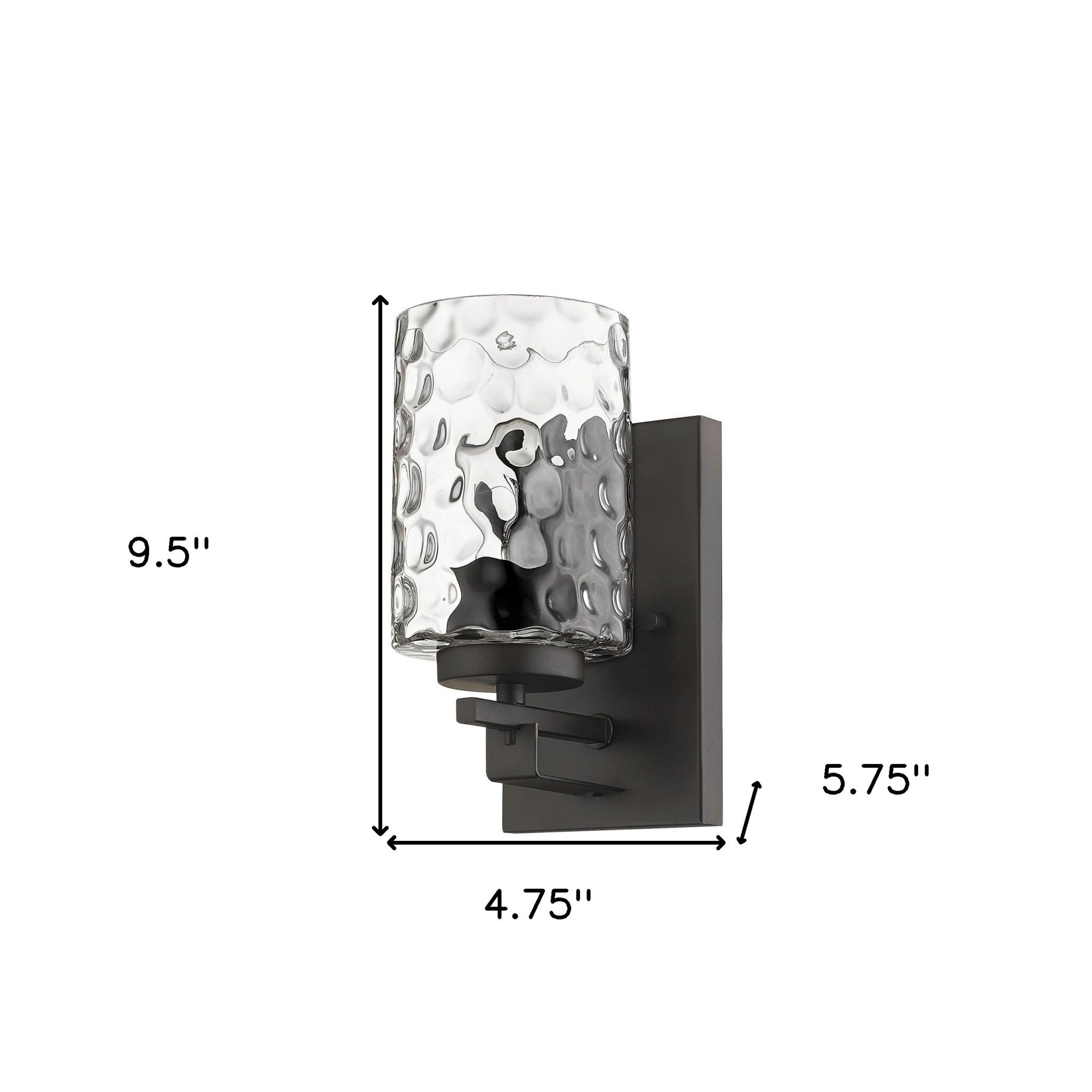 Bronze metal wall sconce with pebbled glass shade – modern indoor single-light fixture shown with dimensions of 9 point 5 inches high by 4 point 75 inches wide by 5 point 75 inches deep