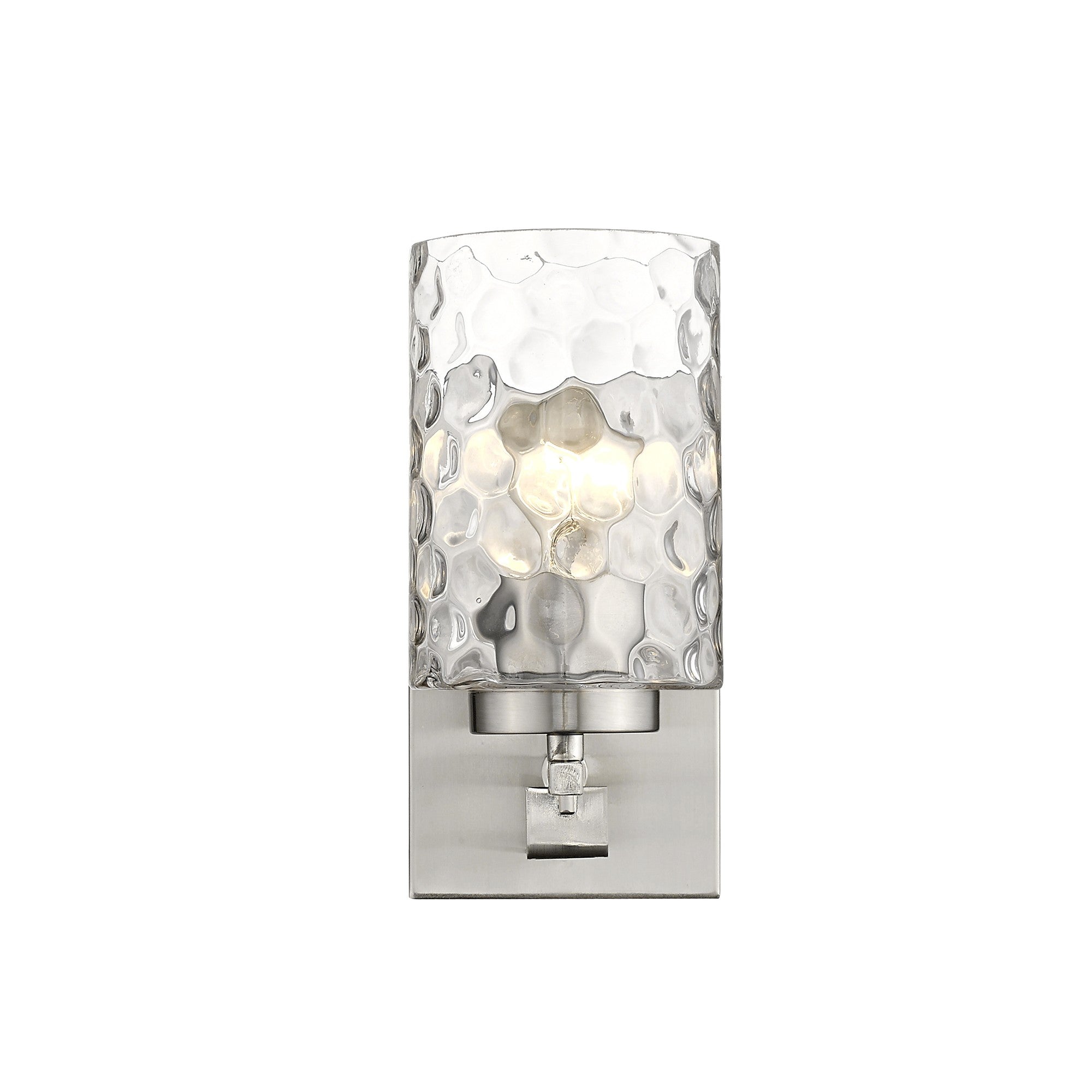 Front view of the lighted Silver metal wall sconce with pebbled glass shade – modern indoor single-light fixture.