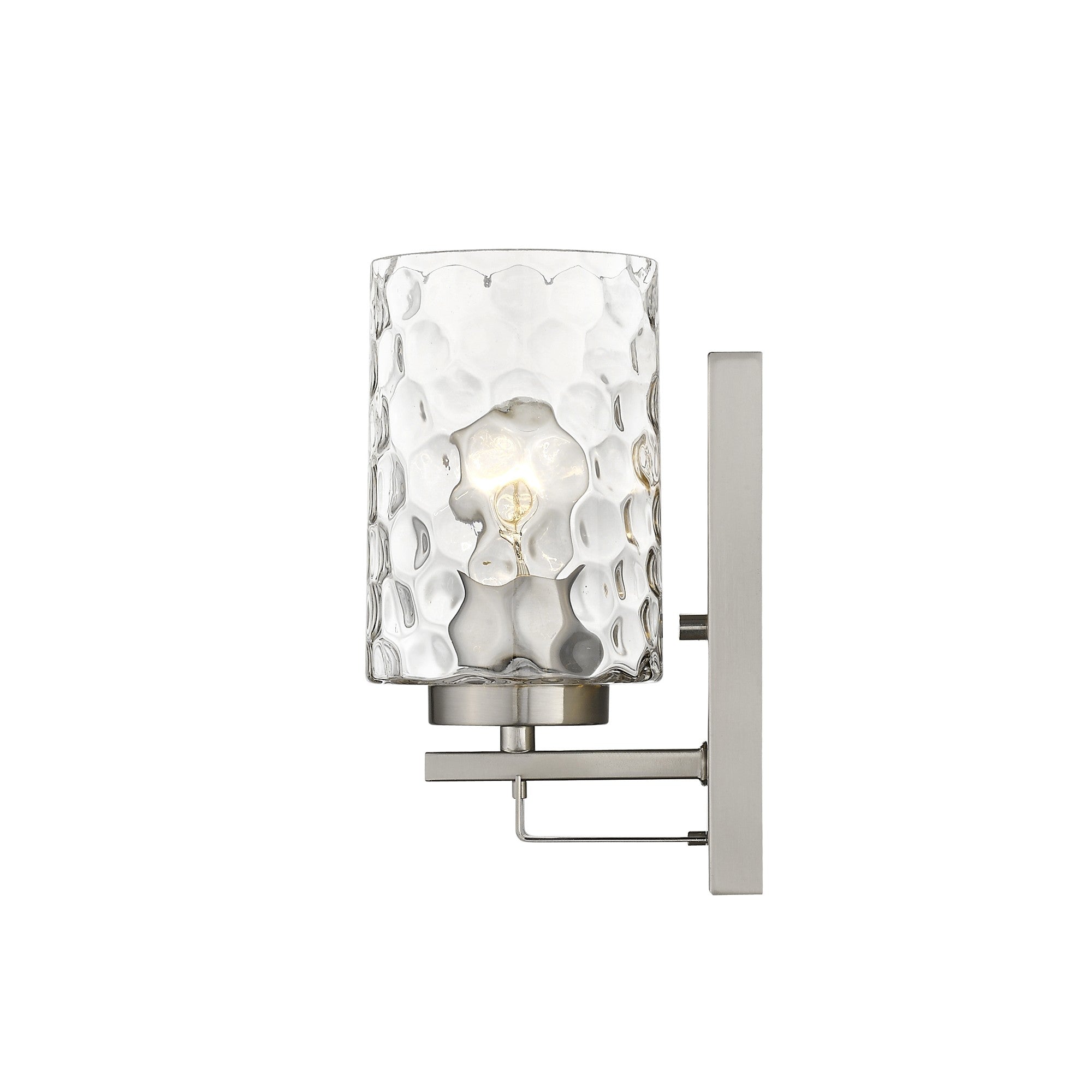 Side view of the lighted Silver metal wall sconce with pebbled glass shade – modern indoor single-light fixture.