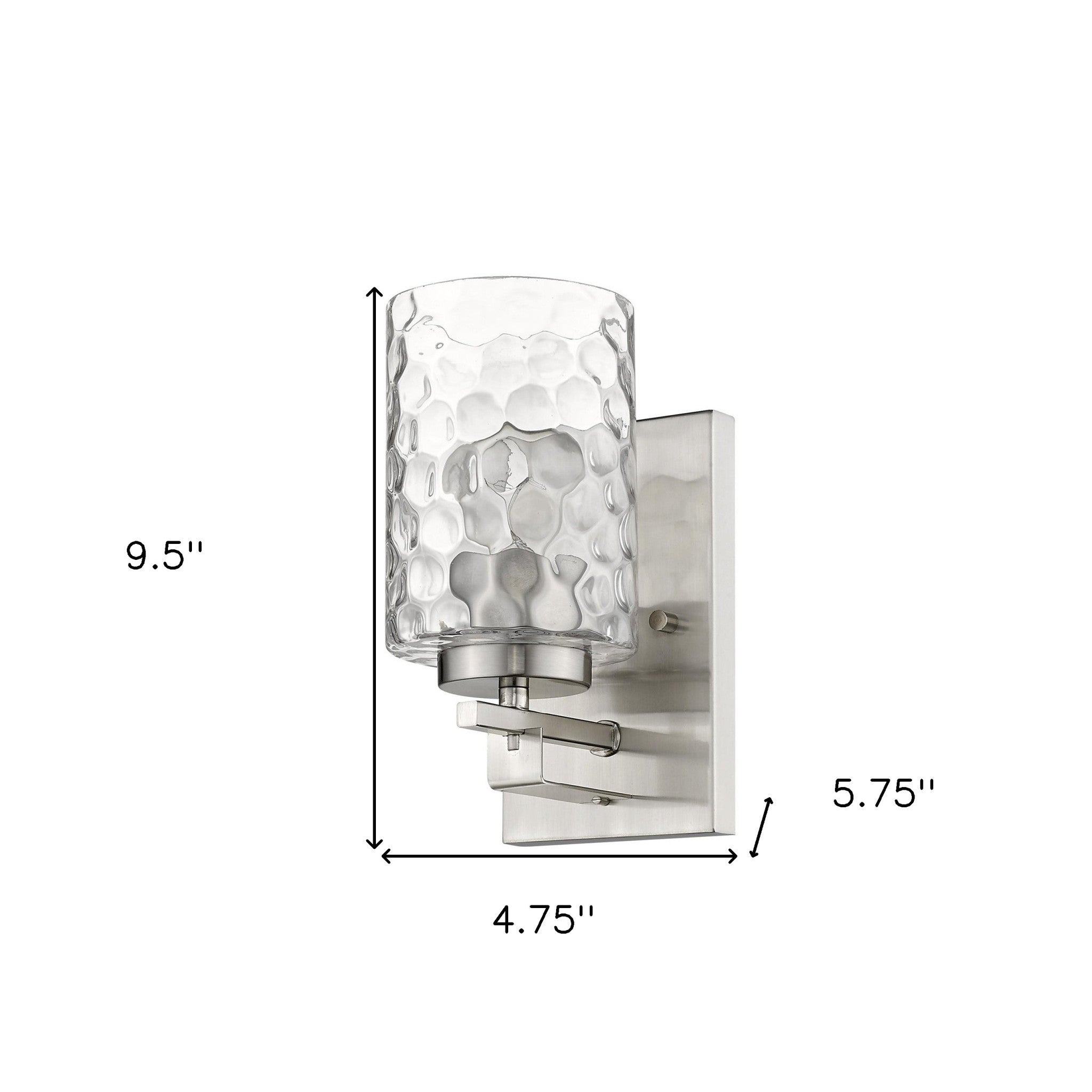 Silver metal wall sconce with pebbled glass shade – modern indoor single-light fixture shown with dimensions of 9 point 5 inches high by 4 point 75 inches wide by 5 point 75 inches deep