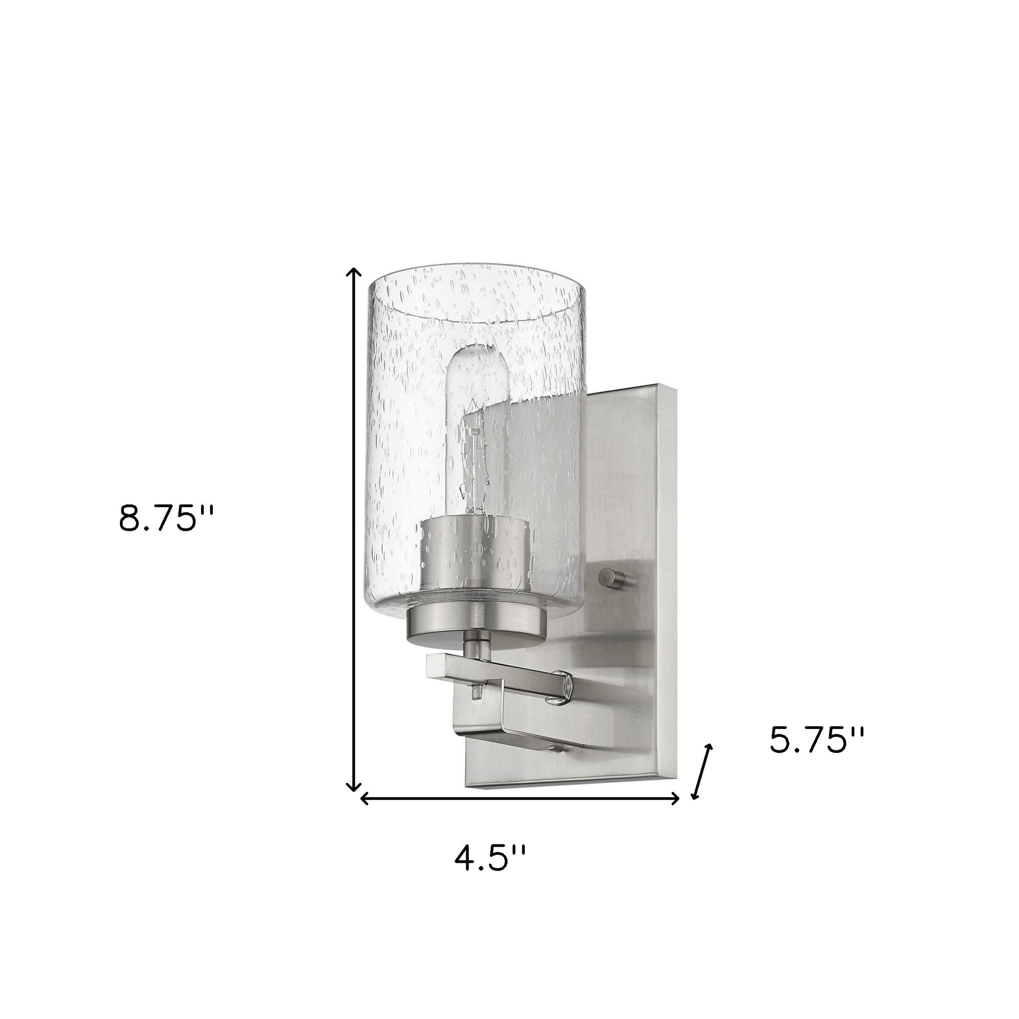 Silver metal wall sconce with raindrop-textured glass shade, modern single-light design shown with dimensions of 8 point 75 inches high by 4 point 5 inches wide by 5 point 75 inches deep