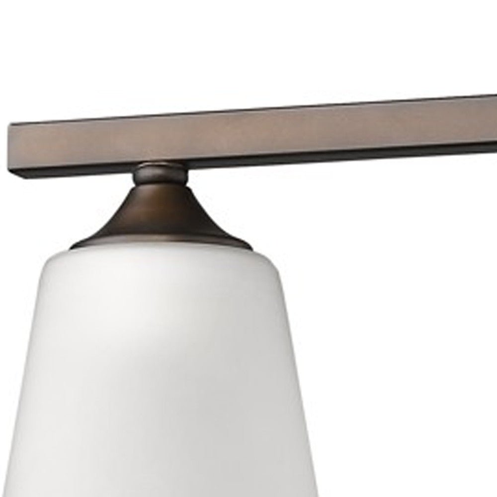 Zoomed in view of the arm and base of the Three Light Bronze Metal Vanity Wall Light with frosted glass shades and bronze finish, modern bathroom lighting fixture, 20.75 inches wide by 8.5 inches high