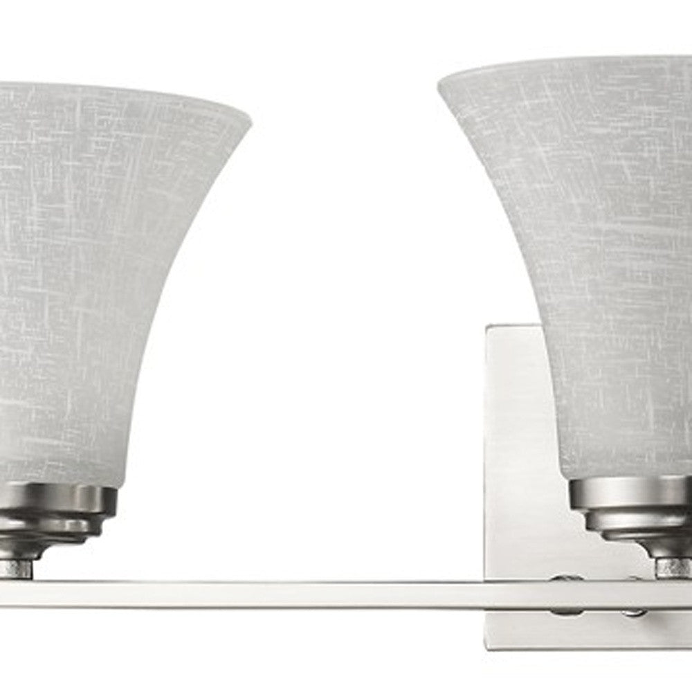 Zoomed in view of the wall plate, glass shade and arm bar of the Three-Light Silver Wall Fixture with Tapered Textured Glass Shades and brushed nickel finish