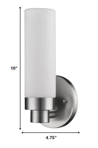 Silver Wall Sconce with Narrow Frosted Cylinder Glass Shade and brushed steel backplate shown with dimensions of 10 inches high by four point seven five inches wide