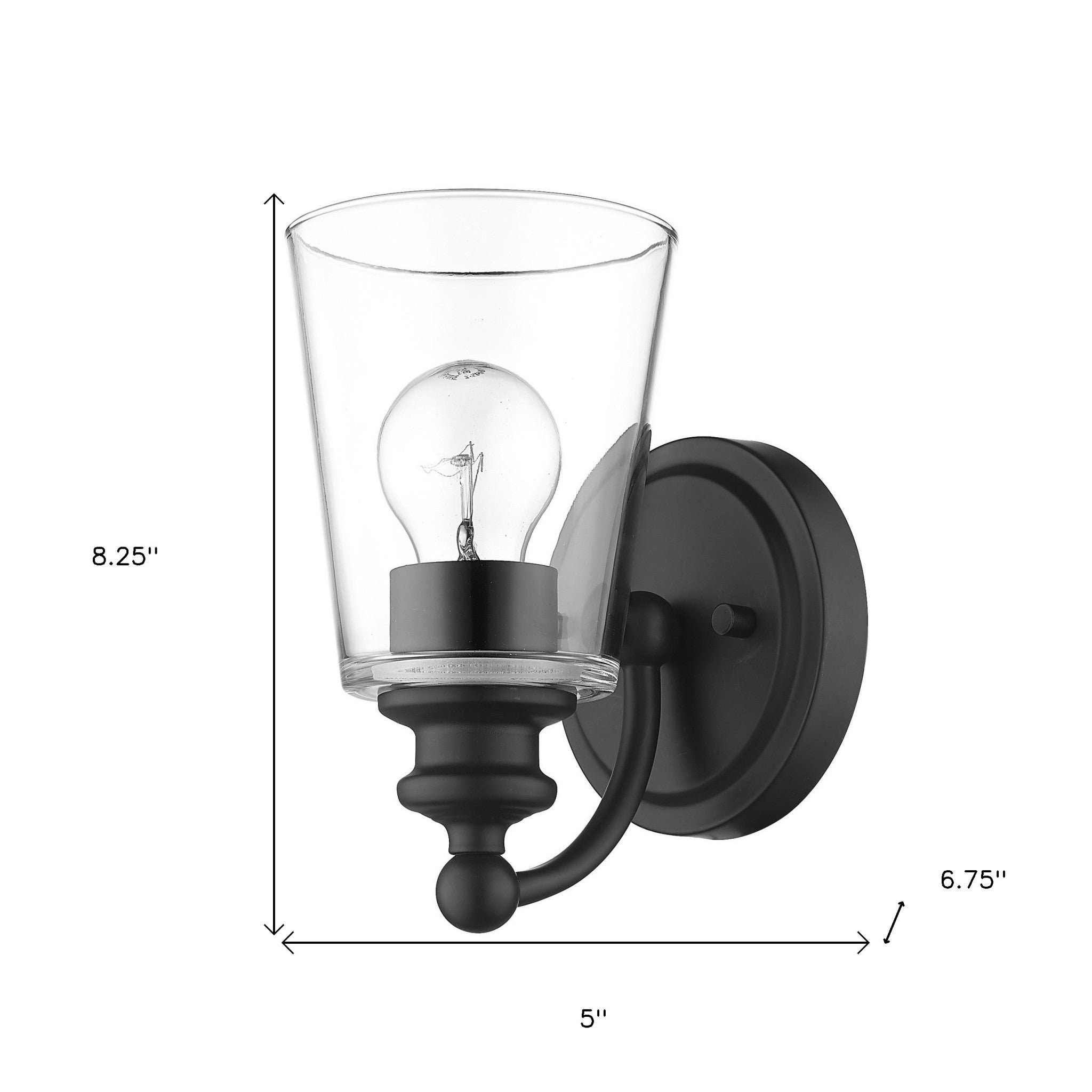 One-Light Matte Black Wall Sconce with clear tapered glass shade and curved arm design shown with dimensions of eight point two five inches high by five inches wide by six point seven five inches deep