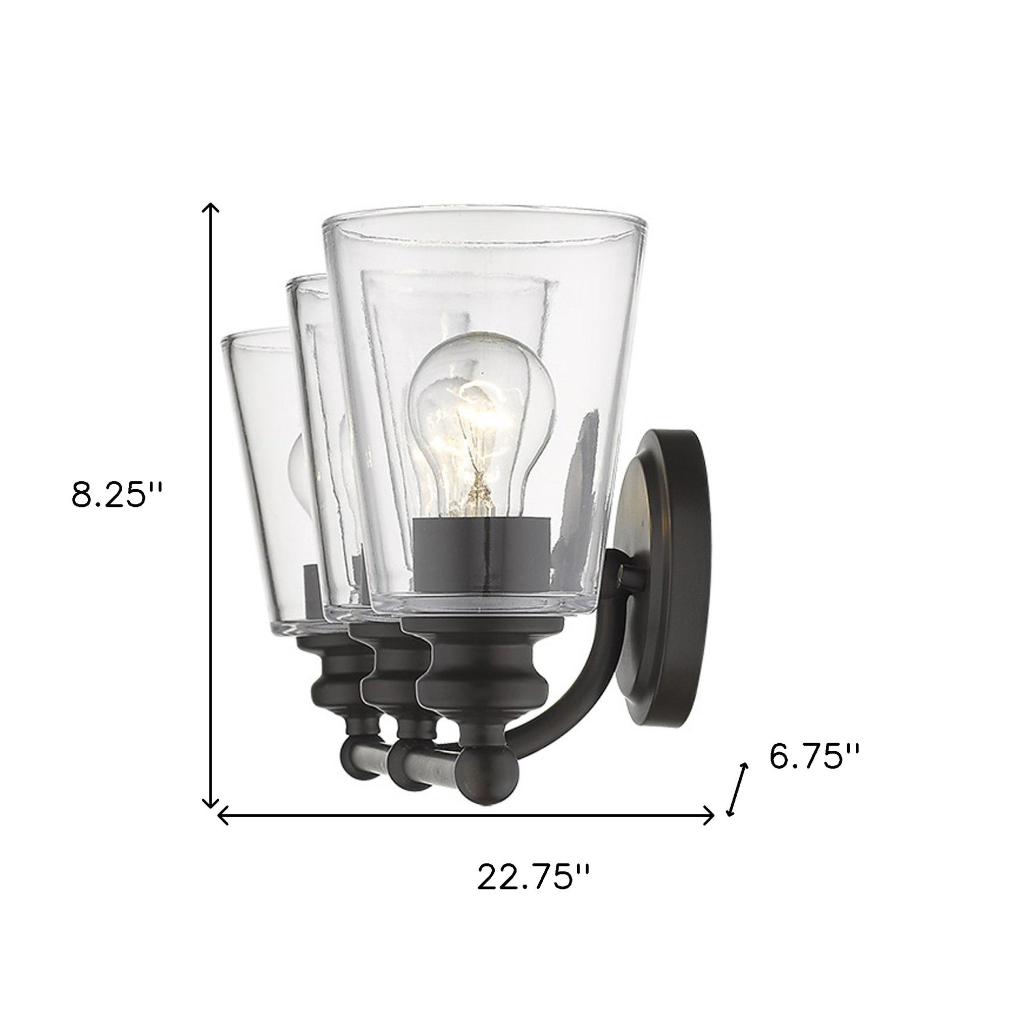 Three-light antique bronze wall sconce with clear tapered glass shades and horizontal bar design shown with dimensions of 8 point two five inches high by twenty two point seven five inches wide by six point seven five inches deep