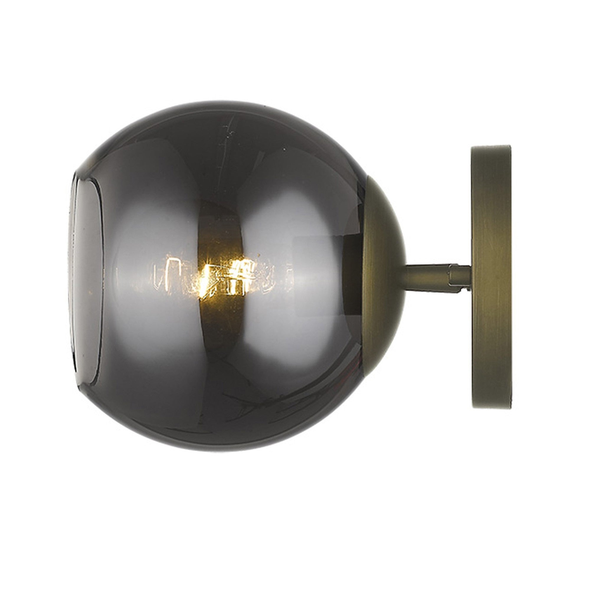 A side view of a  lighted 7-inch wall light fixture with a gold finish and smoked glass shade, featuring a round base and a horizontal bulb holder.