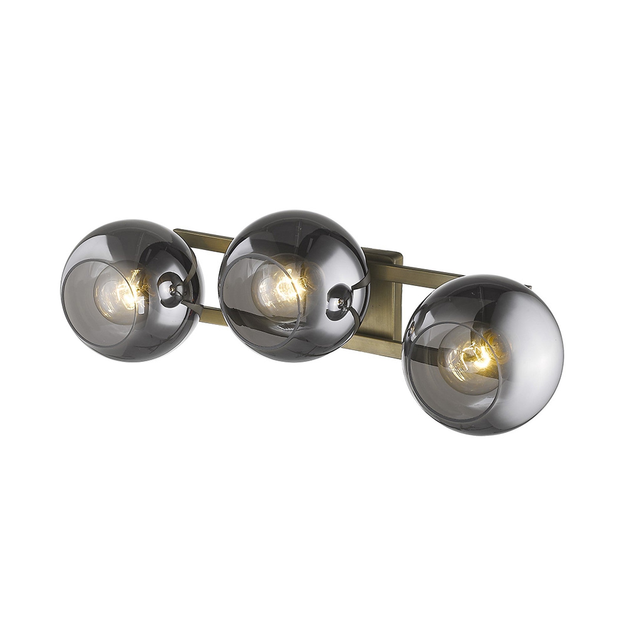 An top down angled view of a lighted Aged brass sconce with three smoked handblown glass shades, emitting a warm light, from the Lunette collection.