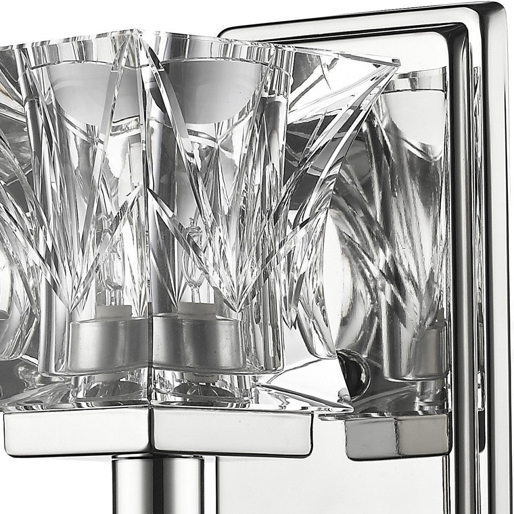 Zoomed in view of the glass hade and wall plate on the Arabella Modern crystal wall sconce with faceted glass shade and polished chrome backplate – luxury accent lighting