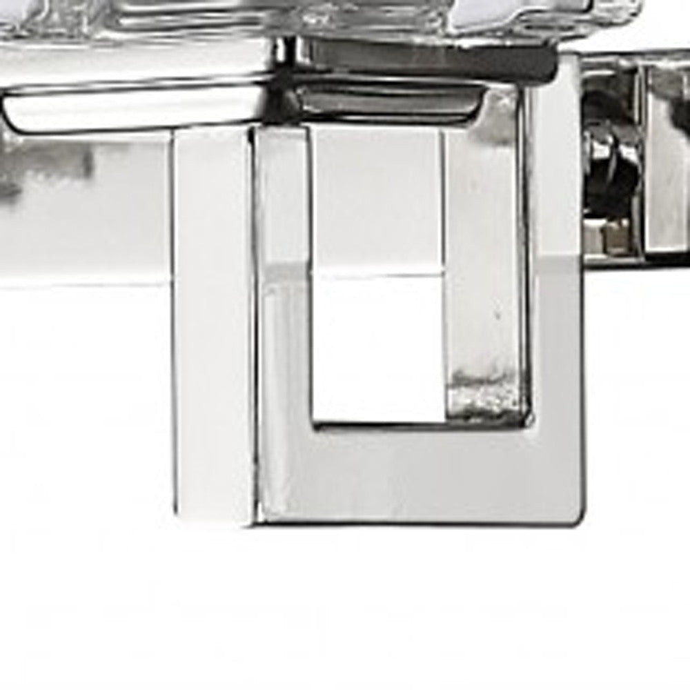 Close up view of one of the arms of the Five-light vanity wall fixture with polished chrome finish and textured glass cube shades