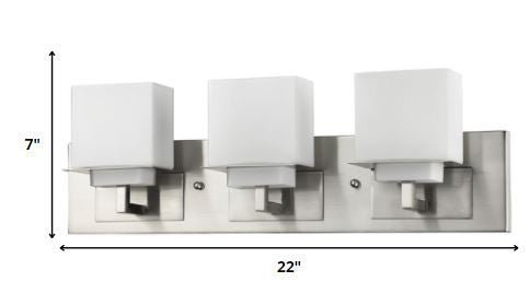 Brushed nickel three-light vanity fixture with square frosted glass shades shown with dimensions