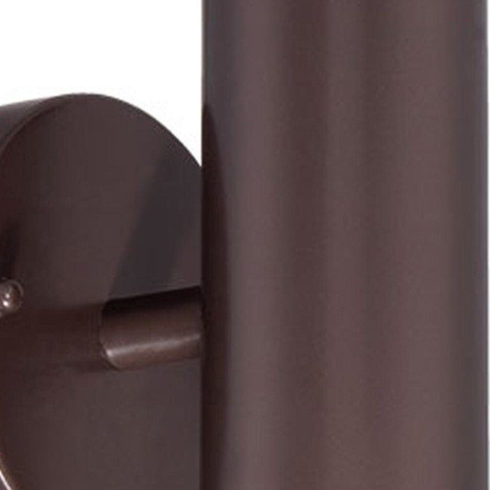 Zoomed-in view of wall plate and arm of Bronze outdoor up and down cylindrical wall sconce with round backplate