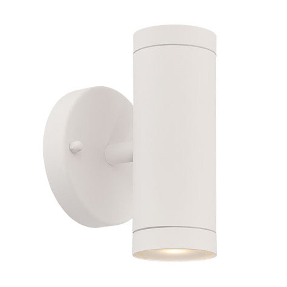 Angled side view of a lighted Modern white cylindrical up and down outdoor wall light with round backplate