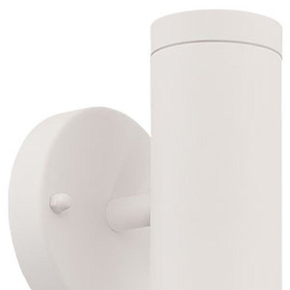 Close-up view of backplate and cylinder top of Modern white cylindrical up and down outdoor wall light with round backplate