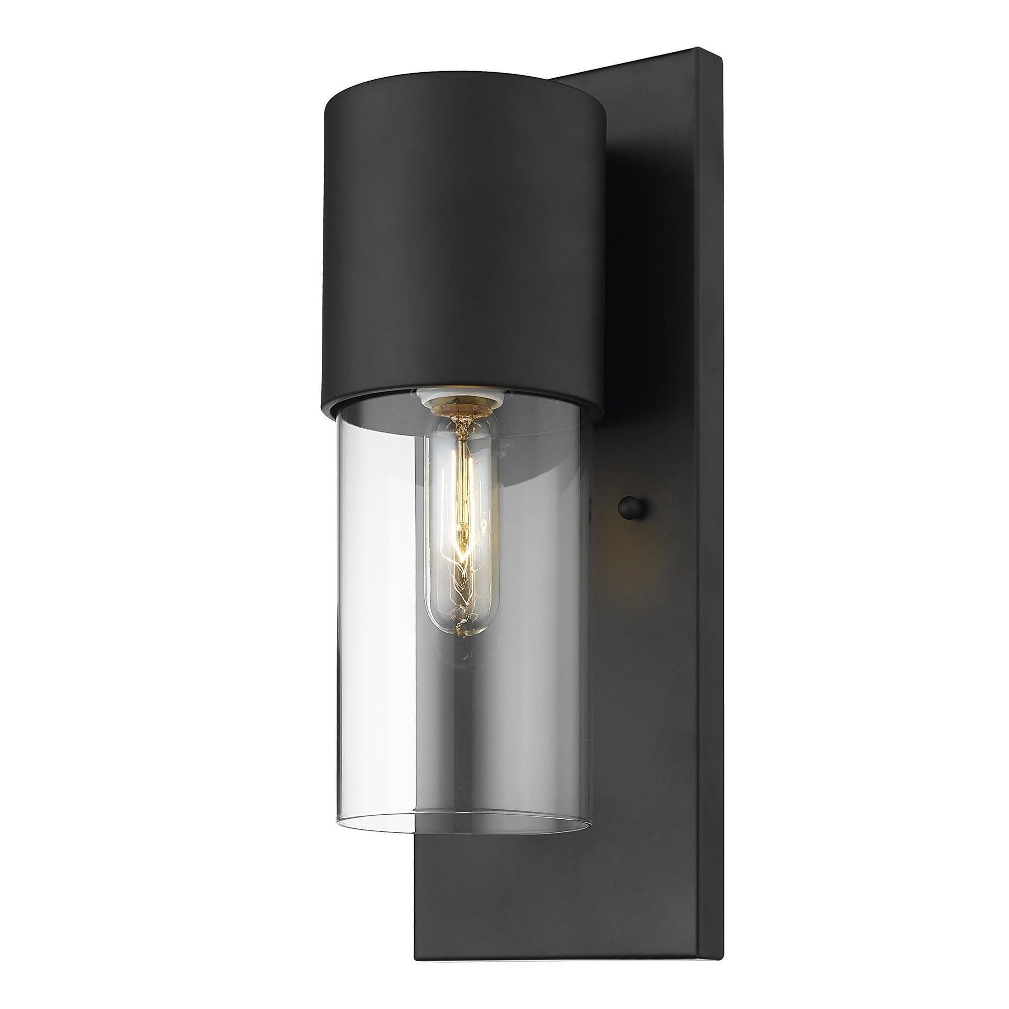 Angled view of a lighted Contemporary matte black wall sconce with clear cylindrical glass shade and rectangular backplate