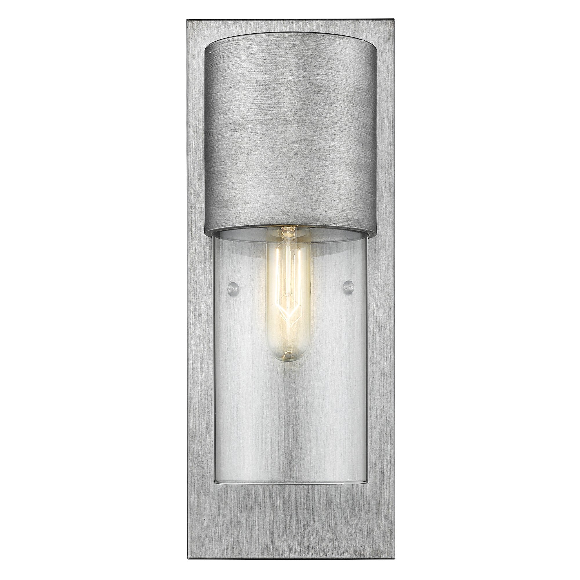 Front view of a lighted Modern brushed nickel wall sconce with clear cylindrical glass shade and vertical backplate