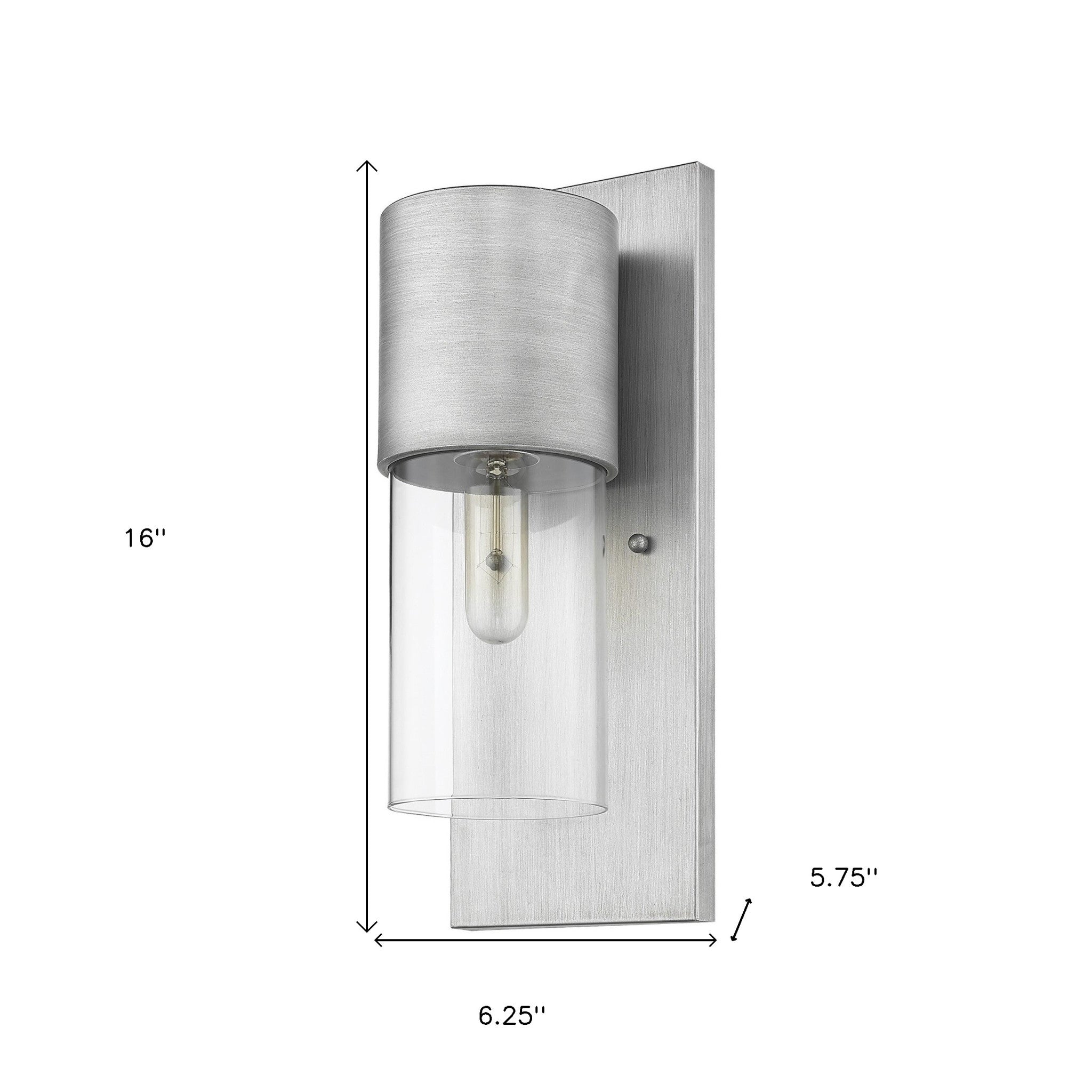 Modern brushed nickel wall sconce with clear cylindrical glass shade and vertical backplate shown with dimensions
