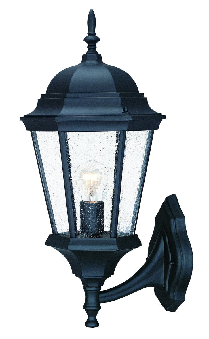 Classic black outdoor wall lantern with seeded glass panels and domed top