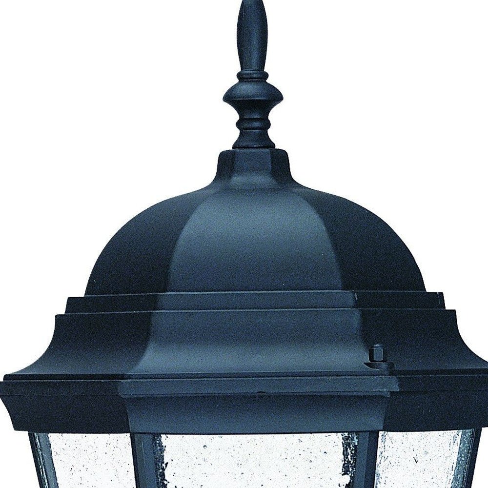 Top view of traditional dome-topped outdoor wall lantern with decorative finial