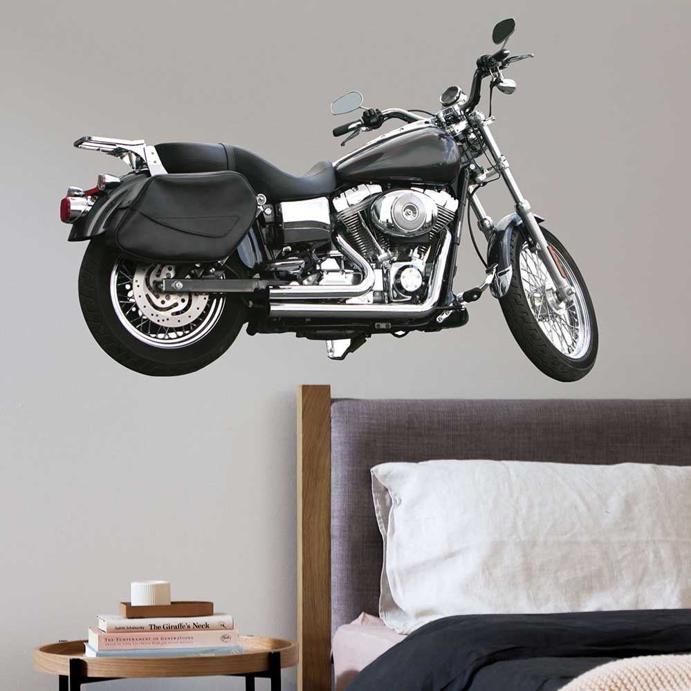 48 inch black and silver commuter motorcycle decal installed above bed and nightstand