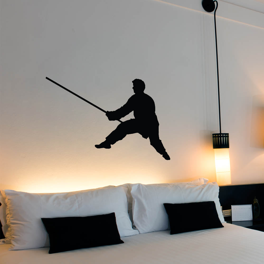 48 inch Martial Arts Staff Silhouette Wall Decal Installed Above Bed