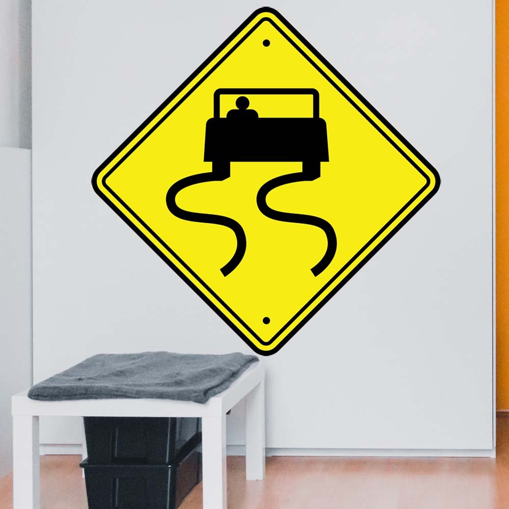 48 inch Slippery When Wet Road Sign Wall Decal Installed Above Bench