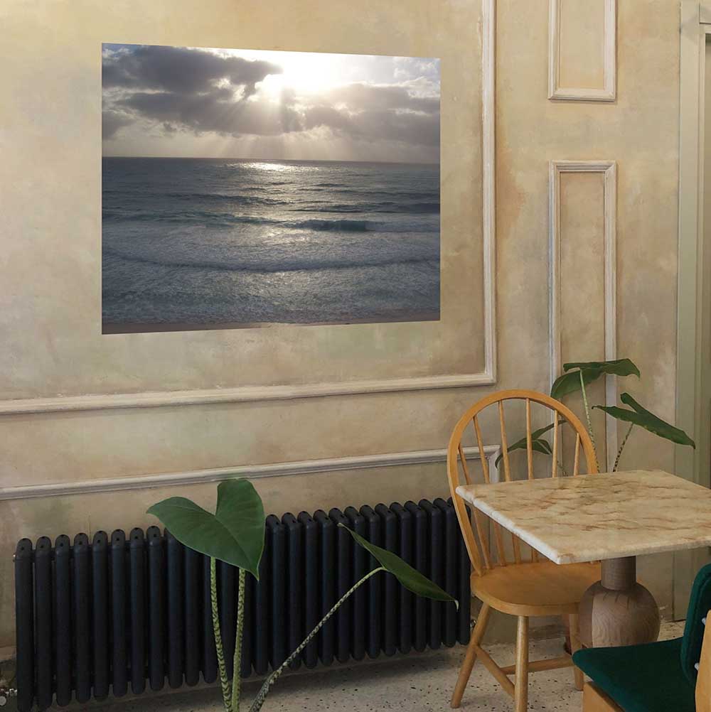 48 inch Sunset Over Ocean Poster Displayed in Dining Area