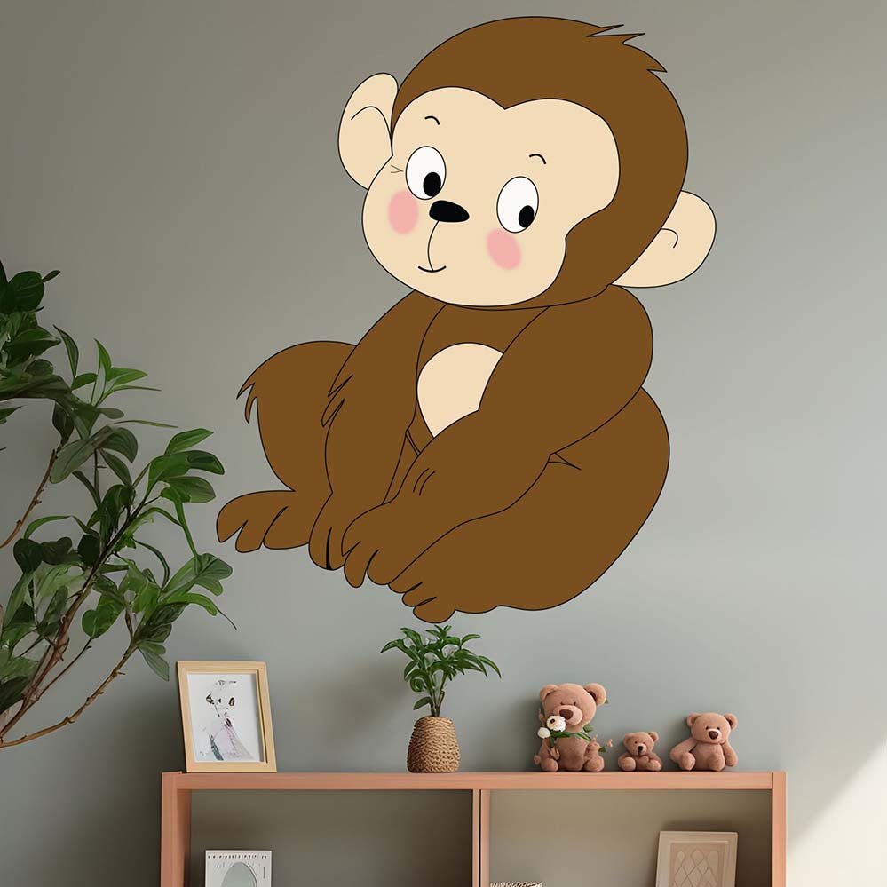 48 inch Baby Mokey cartoon wall decal installed on a wall with a shelf and plants below.