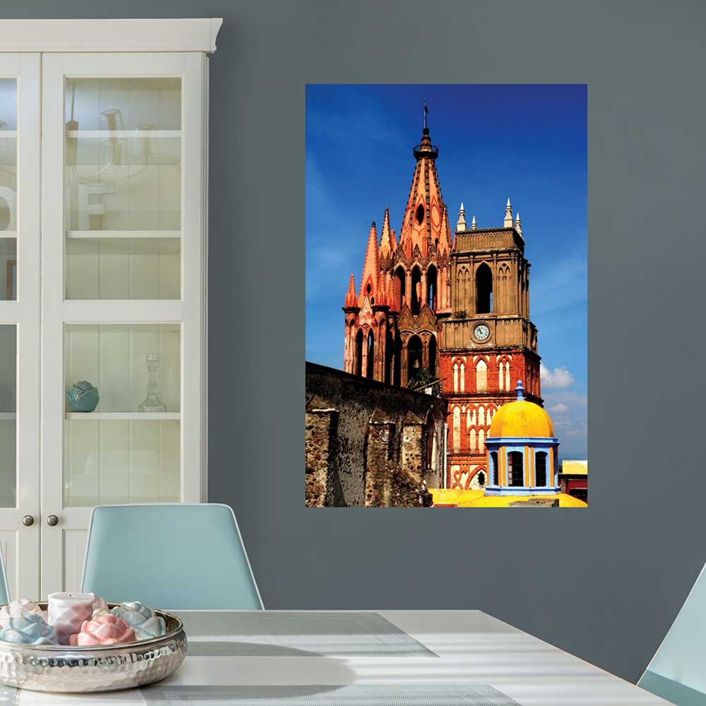 48 inch decal of a colorful Mexican cathedral installed on a gray wall in a dining room