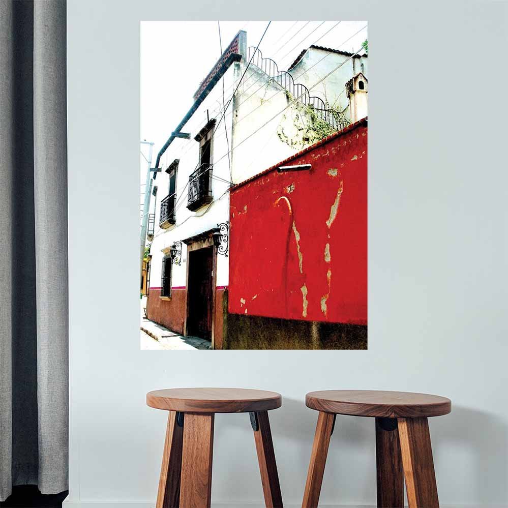48 inch red and white Mexican house architecture decal installed on a wall above two stools