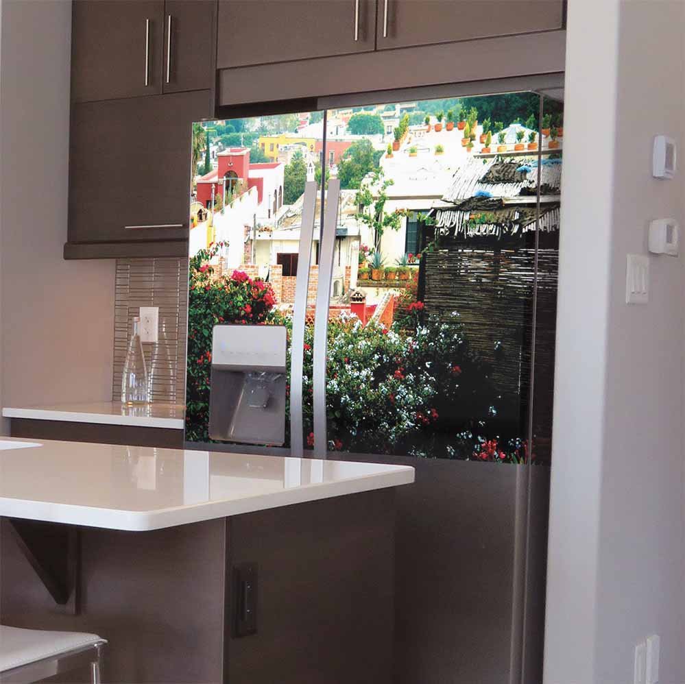 48 inch decal of a rooftop garden in Mexican town looking down on other homes installed on refrigerator in kitchen