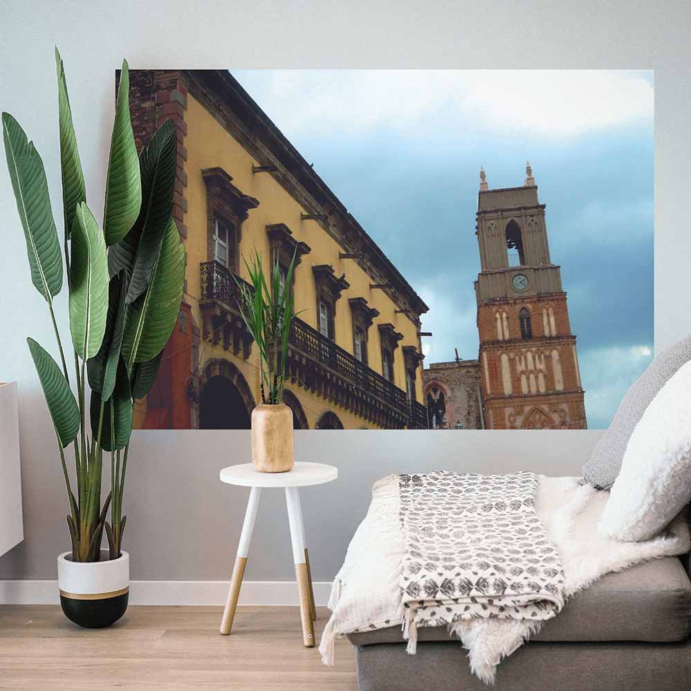 48 inch Mexican cathedral tower and building against a blue sky wall decal installed on wall
