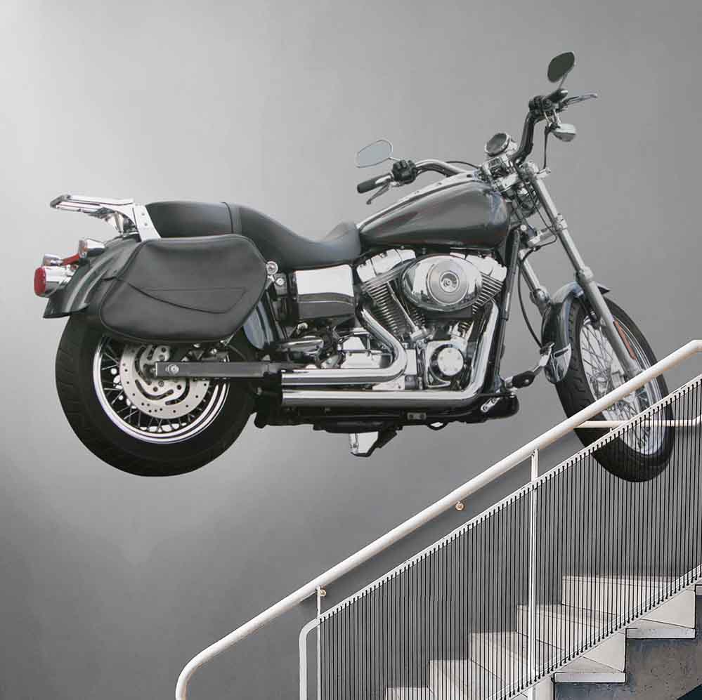 72 inch black and silver commuter motorcycle decal installed on wall next to staircase