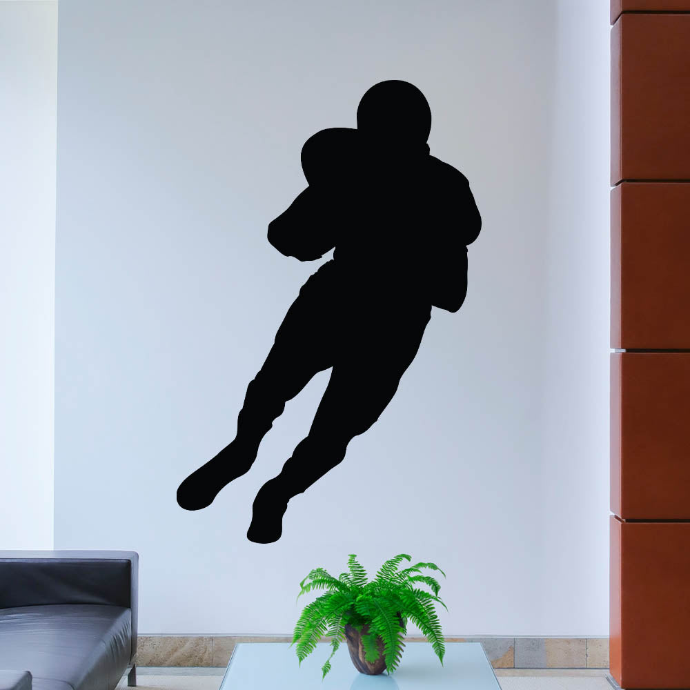 72 inch Football Carrier Silhouette Wall Decal Installed in Sitting Area