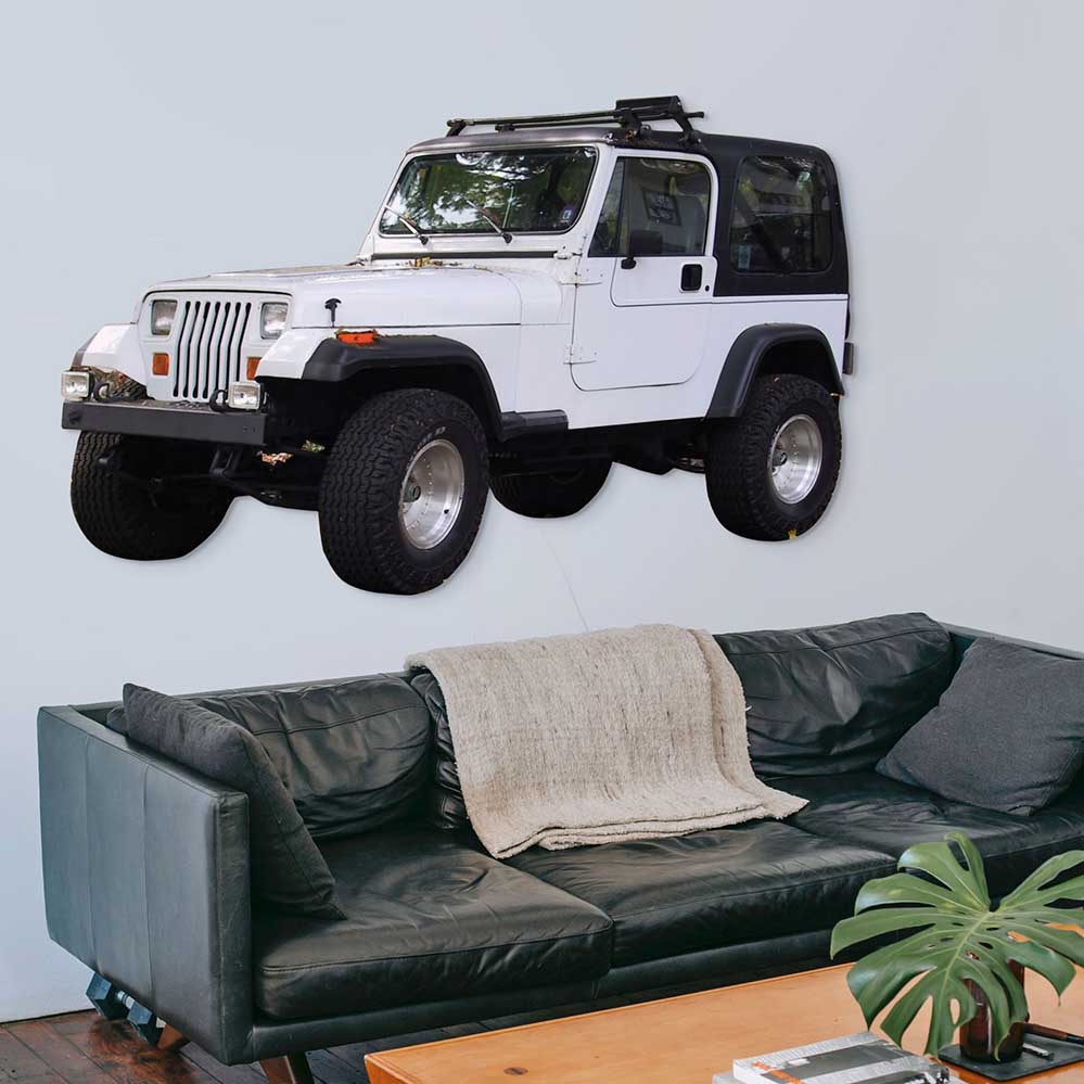 84 inch Jeep decal installed on wall above leather couch