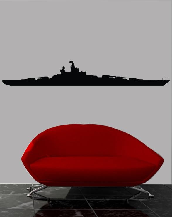 U.S. Navy Battleship I historic naval warship silhouette wall decal by Jaycee Haynes installed above a red sofa