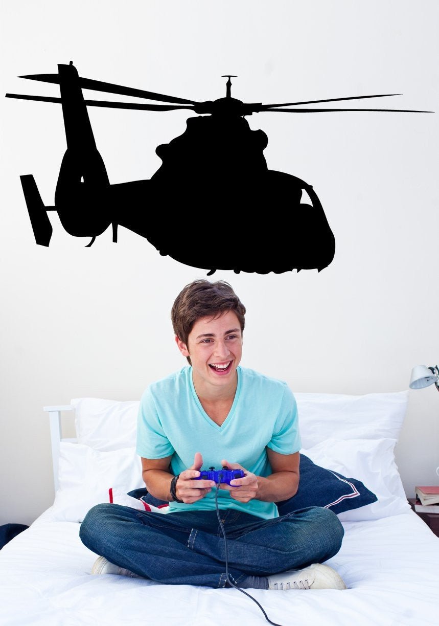 Eurocopter AS332 Super Puma military helicopter silhouette wall decal by Jaycee Haynes installed in teens room