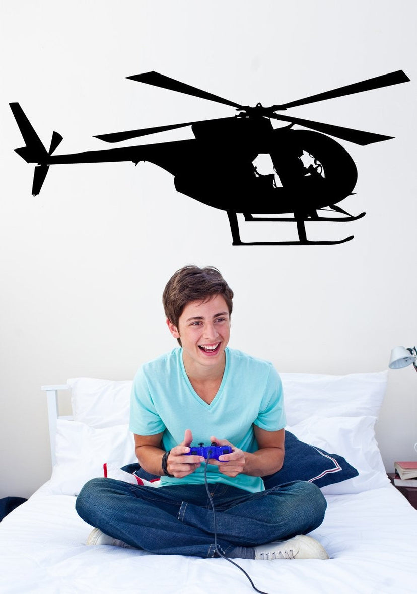Hughes OH-6 Cayuse military helicopter silhouette wall decal by Jaycee Haynes installed in teens bedroom