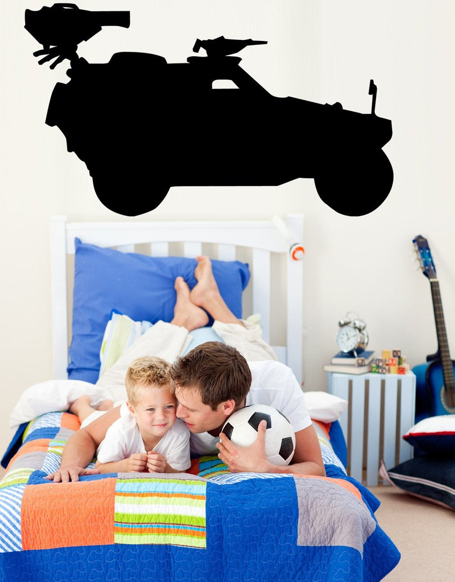 Military light armored vehicle LAV silhouette wall decal by Jaycee Haynes installed in boys bedroom