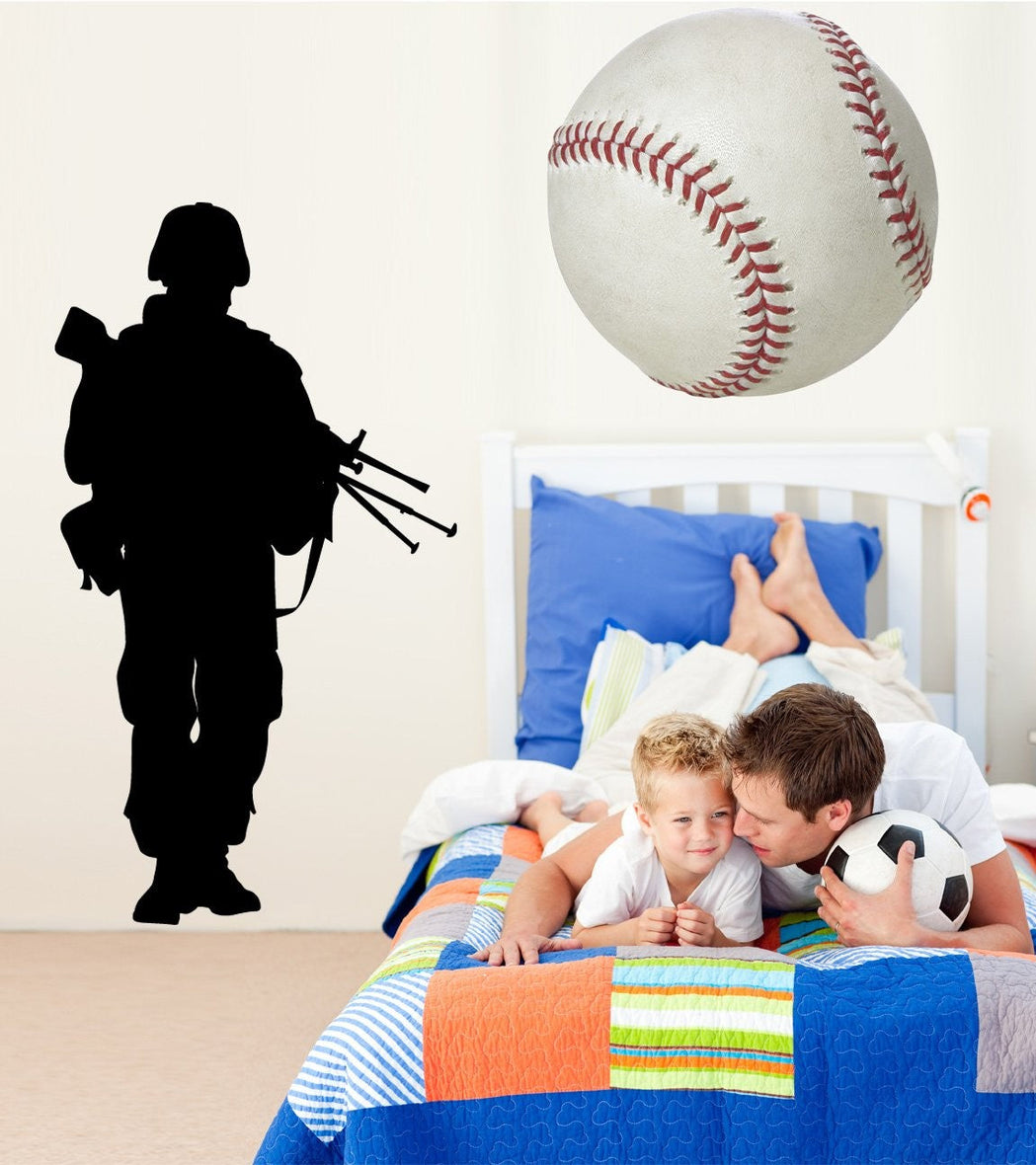 Soldier on patrol military silhouette wall decal by Jaycee Haynes installed in young boys room