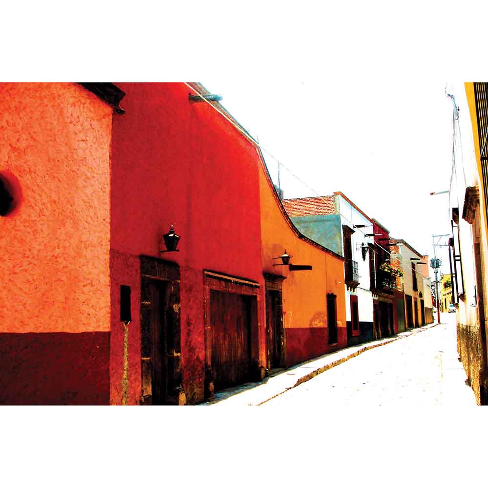 Colorful Mexican street scene with red, orange, and white buildings wall decal printed | Wallhogs.