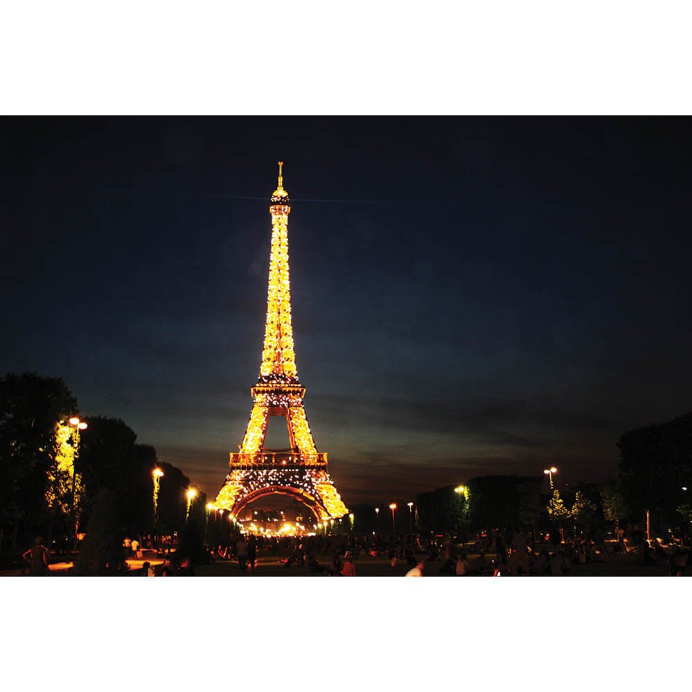 Eiffel Tower illuminated at night with a dark sky background gloss poster printed | Wallhogs